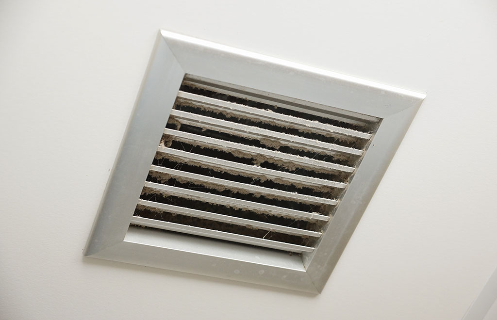 image of a dirty air duct - Luke's Plumbing & Air Conditioning
