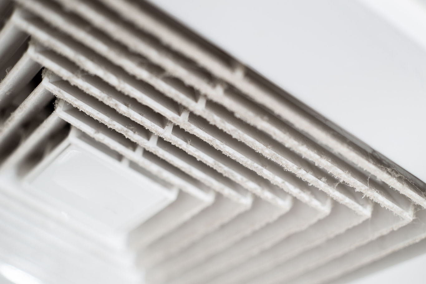 close-up image of a dirty duct - Luke's Plumbing & Air Conditioning